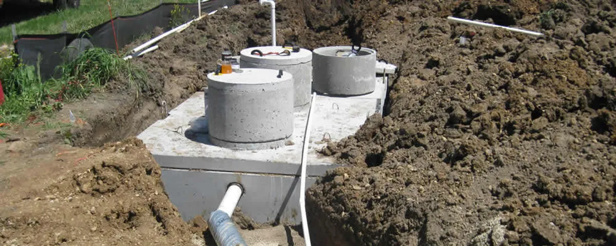Septic system repair and installation site with tank access ports in Seattle, WA